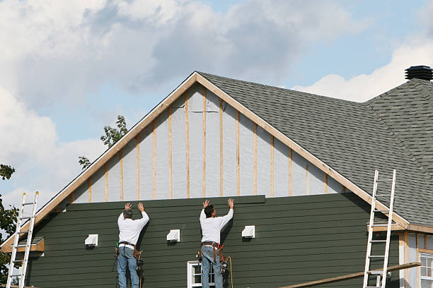 Professional Siding technician working in Frederick, CO